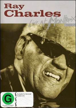 A person wearing sunglasses and smiling
Description automatically generated