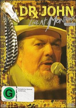 A person with a beard and a microphone
Description automatically generated