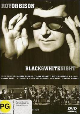 A person holding his glasses
Description automatically generated