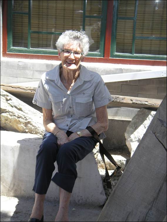 A person sitting on a rock

AI-generated content may be incorrect.