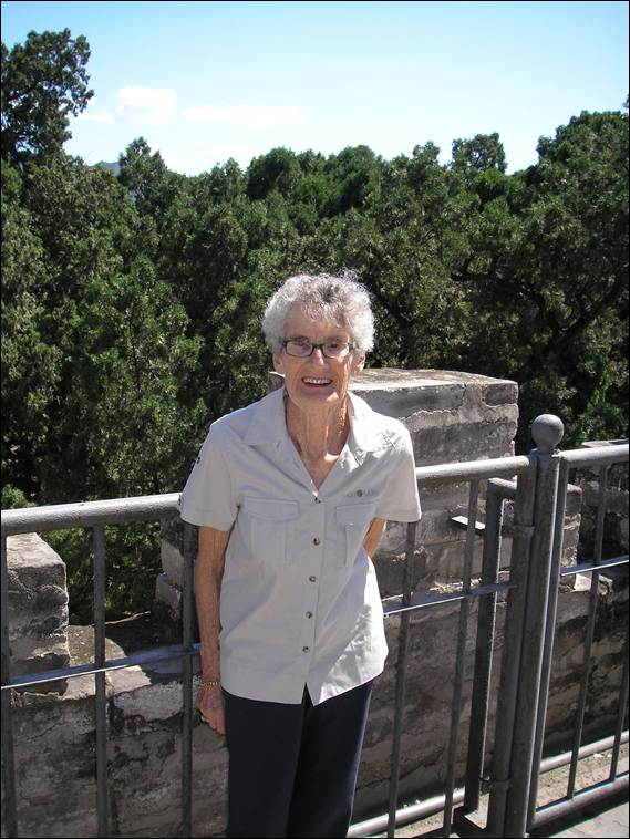 A person standing next to a railing

AI-generated content may be incorrect.