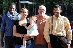 A group of people posing for a photo

AI-generated content may be incorrect.