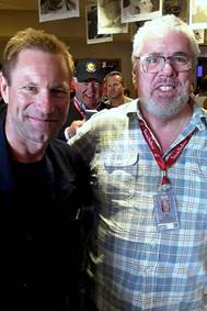 A couple of men smiling at the camera

AI-generated content may be incorrect.