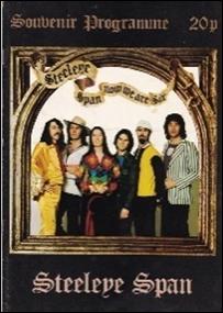 A group of people standing in a frame

Description automatically generated